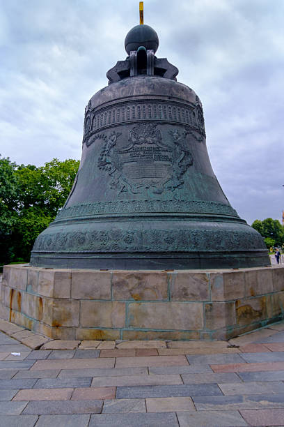 MOSCOW, RUSSIA - AUGUST 2, 2019: The Tsar Bell. also known as the Tsarsky Kolokol, Tsar Kolokol III, or Royal Bell, is a 6.14-metre (20.1 ft) tall, 6.6-metre (22 ft) diameter bell on display on the grounds of the Moscow Kremlin. The bell was commissioned by Empress Anna Ivanovna, niece of Peter the Great.