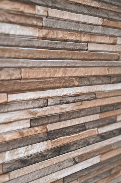 istock Interior Wall made of multi coloured natural stone bricks 2209833876