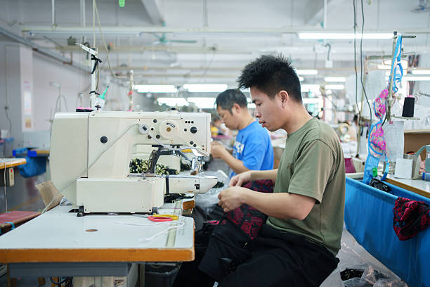 istock Asian male workers in underwear factories 2209835156