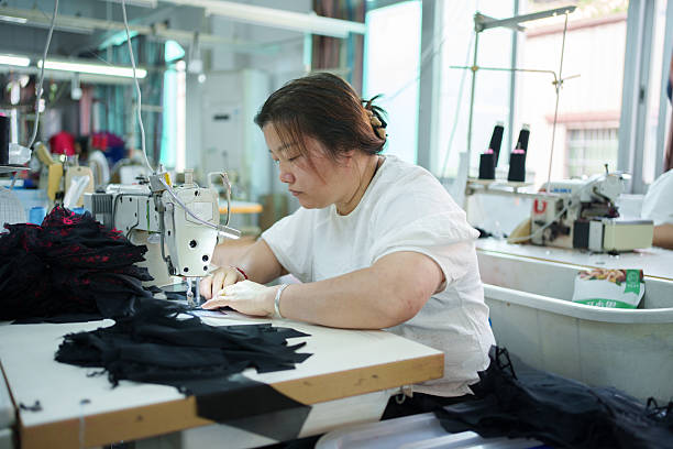 istock Underwear sewing worker in a garment factory 2209835694