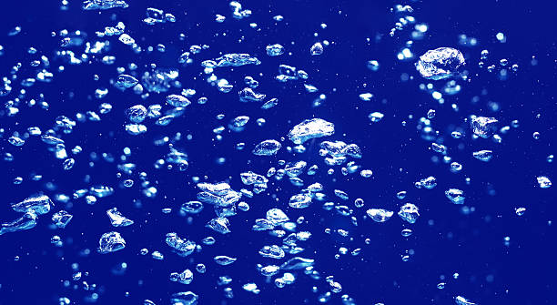 istock Air Bubbles Float Up Under Water. Pure Drinking Water, Oxygen Relaxation. Blue Water Textured Background. 2209837864