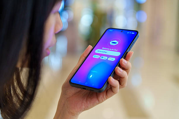 istock Woman using voice-based AI assistant on smartphone 2209840511