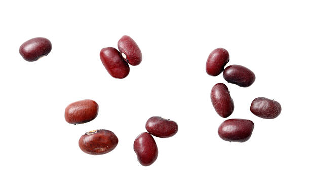 istock A bunch of red beans are scattered on a white background 2209840531