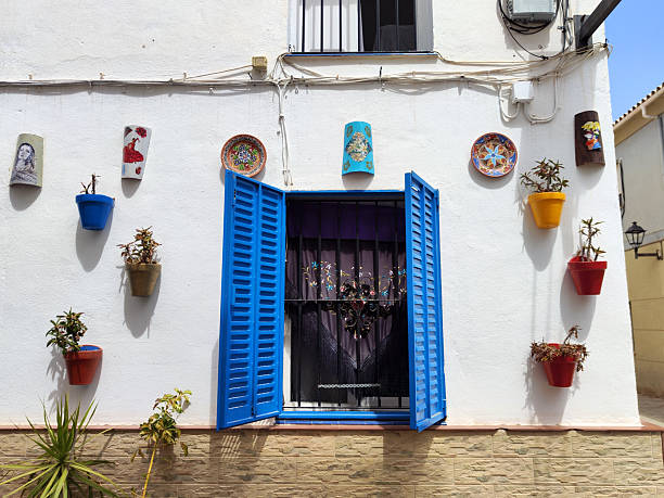 Traditional residential buildings architecture in Malaga downtown, andalusia.