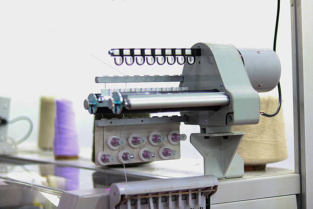 istock The image of a machine for embroidery on a white background 2209845648