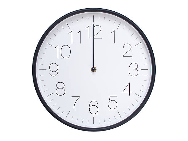 Simple wall clock with black frame and white face displaying 00:00 or 12:00. Ideal for time, schedule, and punctuality themes.
