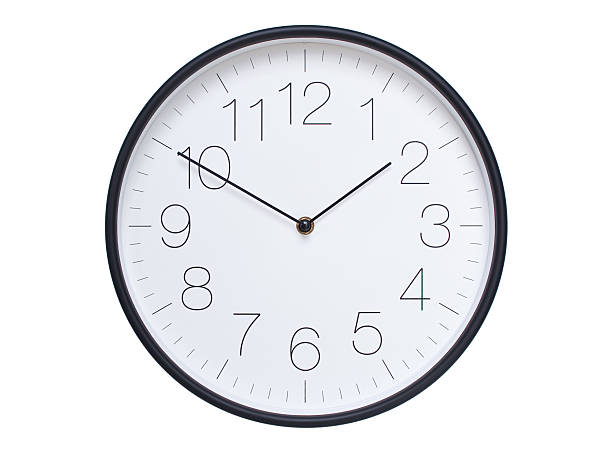 Simple wall clock with black frame and white face displaying 01:50 or 13:50. Ideal for time, schedule, and punctuality themes.