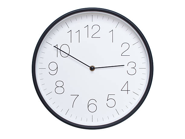 Simple wall clock with black frame and white face displaying 02:50 or 14:50. Ideal for time, schedule, and punctuality themes.