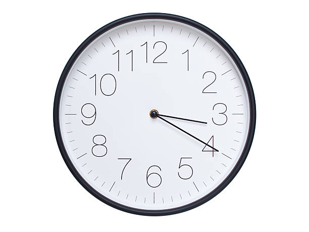 istock Simple wall clock with black frame and white face displaying 03:20 or 15:20. Ideal for time, schedule, and punctuality themes. 2209849972