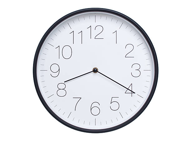 istock Simple wall clock with black frame and white face displaying 08:20 or 20:20. Ideal for time, schedule, and punctuality themes. 2209850569
