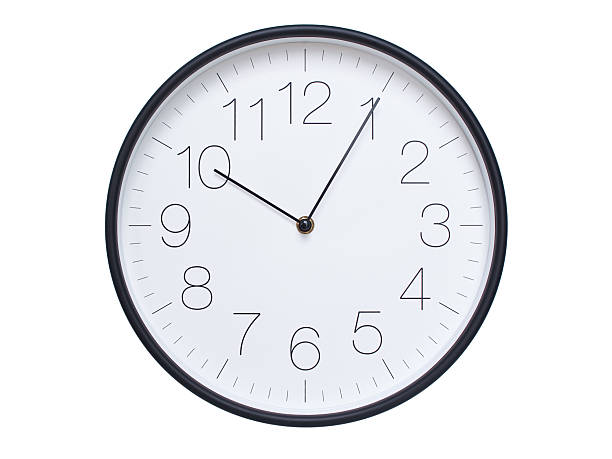 istock Simple wall clock with black frame and white face displaying 10:05 or 22:05. Ideal for time, schedule, and punctuality themes. 2209850627