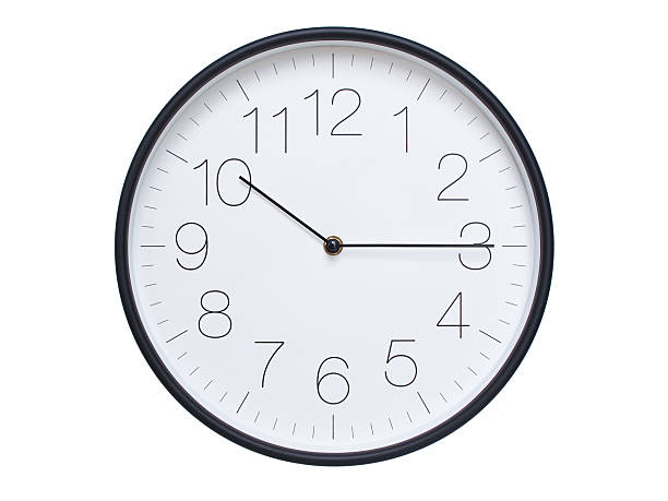 istock Simple wall clock with black frame and white face displaying 10:15 or 22:15. Ideal for time, schedule, and punctuality themes. 2209850636
