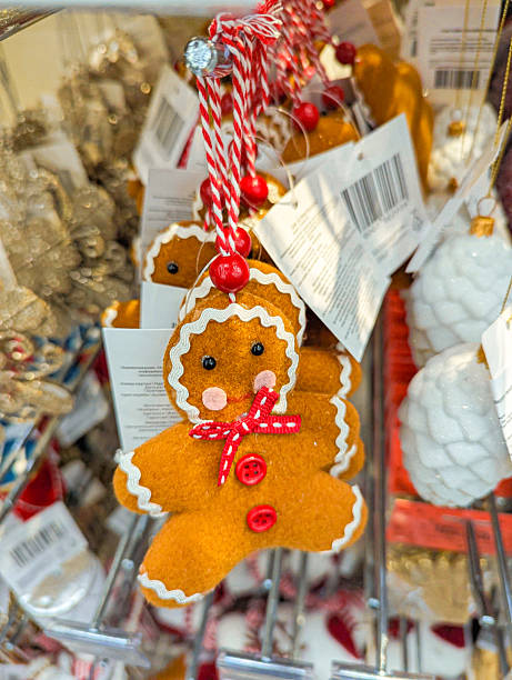 istock Festive gingerbread toy hanging on Christmas tree 2209852053