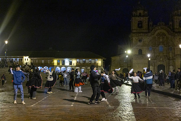 Peru, Cusco-March 16,2025: People gather in Cusco’s main square, Plaza de Armas, enjoying the lively atmosphere
