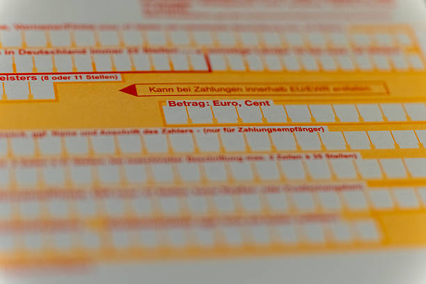 istock Payment form filled with details in Euro currency while preparing for a financial transaction at an office 2209855407