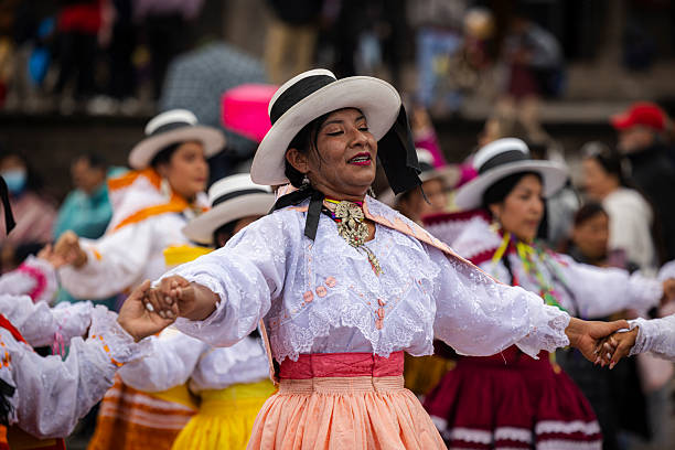 Indigenous locals dressed in traditional Andean attire perform a cultural dance and sing folk songs in the historic main square as part of an annual festival celebrating Inti Raymi, an ancient Incan tradition honoring the Sun GodPeru, Cusco-March 16,2025: