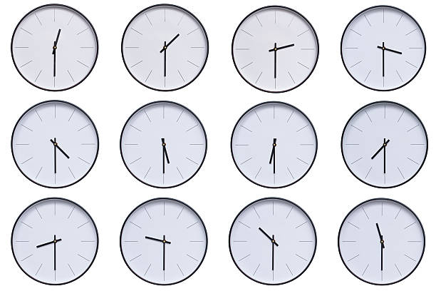 Round Silver Wall Clock Showing 00:30 or 12:30 Isolated-White. Useful for concepts like noon, midnight, deadline, countdown, or time management.