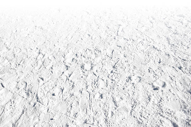 Snow surface with shoe prints and other traces in natural light, Texture backgrounds
