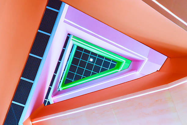 Multi-coloured rotating staircase in a modern building