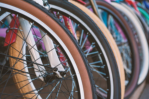 istock Colorful bicycle wheels in perfect alignment highlight urban mobility 2209860066