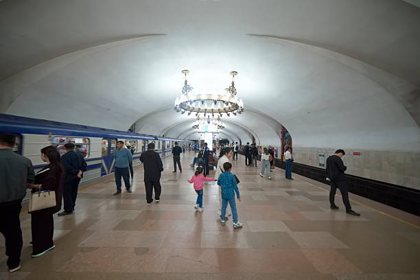 Tashkent, Uzbekistan – March 23, 2025, Inside the Chilonzor Metro Station, people they waiting for Metro for pick up and drop off in the right stations