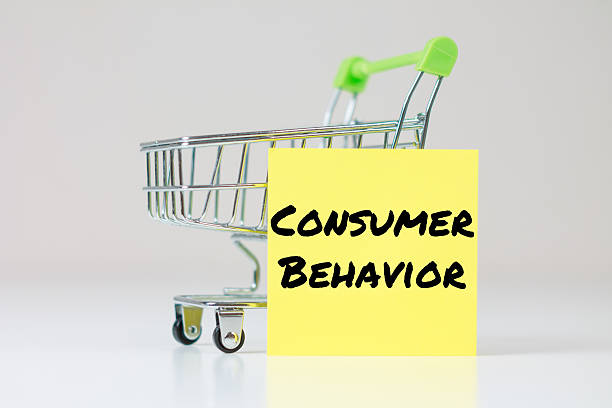 istock Consumer Behavior inscription on a colored sticker 2209866117