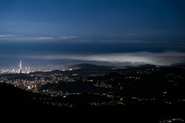 istock City Dreams Under Gliding Clouds: Spring Night at Lion's Head Mountain. 2209880198