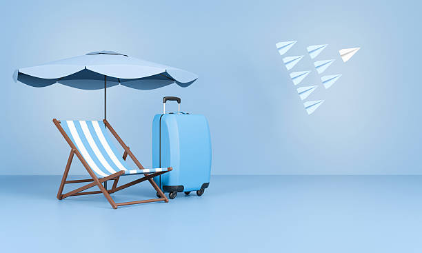 istock Striped deck chair and suitcase 2209881616
