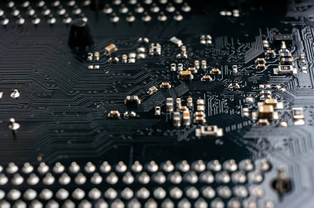istock The back side of the electronic board with connecting tracks and electronic components 2209885396