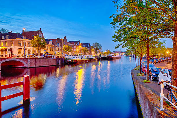 istock Evening Twilight View of Harlem Sight on Spaarne River On The Background At twilight. 2209887630