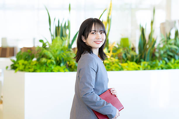 istock business woman working in the office 2209890070