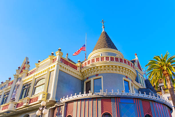 Los Angeles, California - January 8, 2025: View of The Magic Castle in Los Angeles showcasing intricate architecture, including a turret and flag, under a clear blue sky.