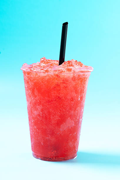 istock Red strawberry slushie isolated on blue background 2209892280