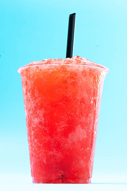 istock Red strawberry slushie isolated on blue background 2209892300