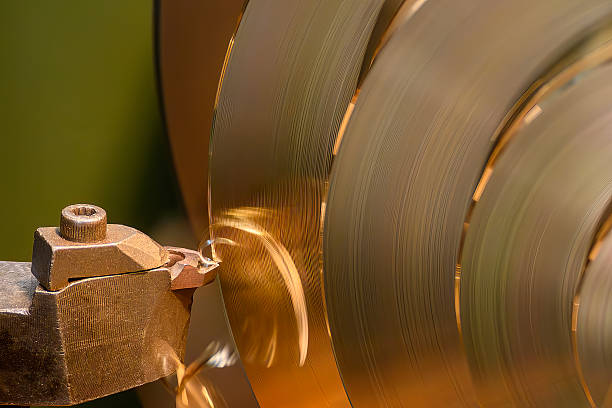 istock Close up scene the lathe machine finish cut the brass material. 2209893145