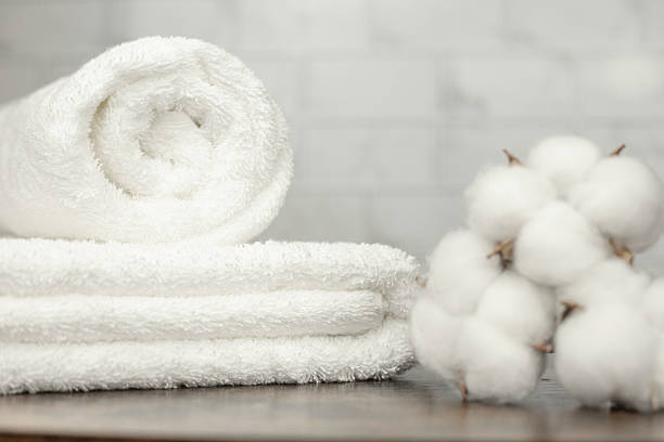 istock White terry towel. Cotton towel. White basin. Bathroom 2209895975