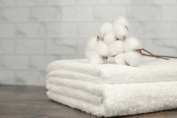 istock White terry towel. Cotton towel. White basin. Bathroom 2209896165