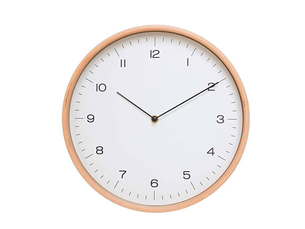istock Minimal wall clock with light wood frame and white face displaying 10:10 or 22:10. Perfect for clean, modern concepts about time and scheduling. 2209903138