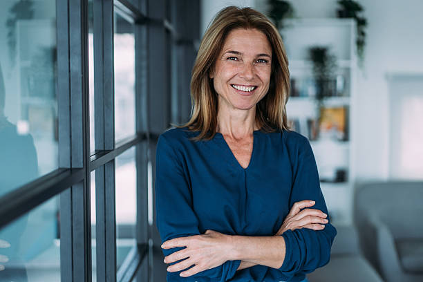 istock Confident businesswoman in modern office. 2209911740