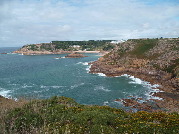 View of the sea from the coast of Jersey on a sunny day