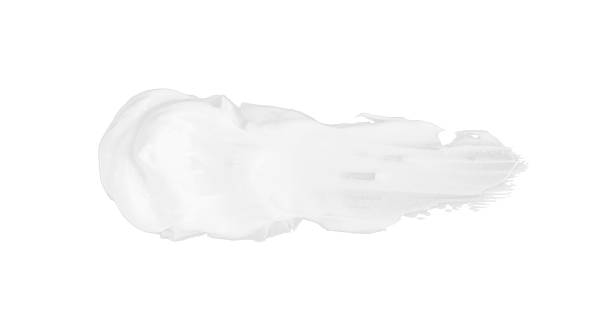 istock smear of white paste isolated on white 2209924033