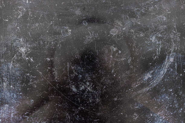 istock black enameled metal with stains and scratches 2209935048