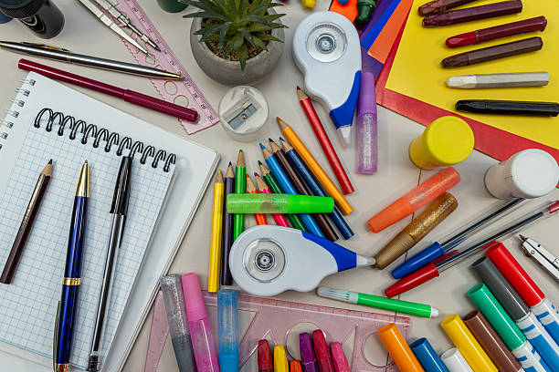 istock school supplies on white desk background ready for your design. Back top school concept 2209935155