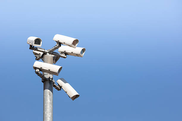 Six security cameras on pole. Video surveillance. CCTV cameras.
