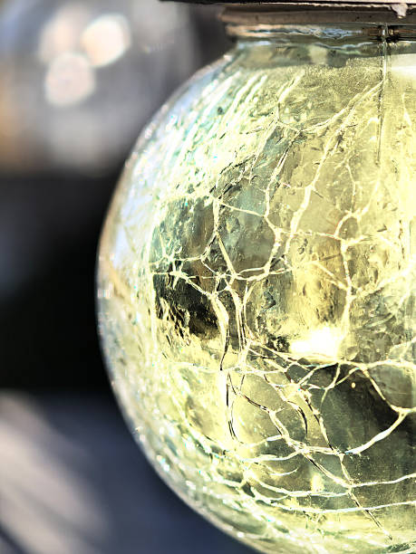 Close-up of a lamp with special designed cracked glass globe. Shallow depth of field.