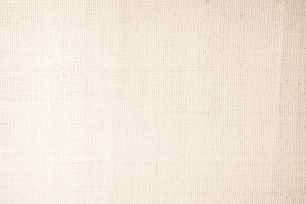 istock Brown sackcloth woven texture background in natural pattern. Jute hessian burlap, linen background in light beige cream color blank. Weaving canvas fiber line cotton cloth textured as organic. 2209969465