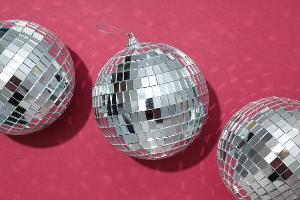 istock Beautiful disco balls on a red background 2209984668