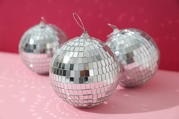 istock Beautiful disco balls on a red background 2209985250