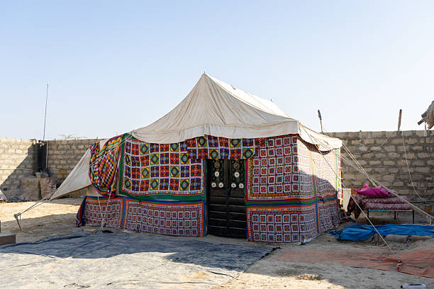 istock traditional desert tents in open landscape with bright sky 2209986573