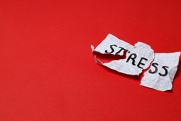 istock Paper with word Stress on red background, space for text 2209987980